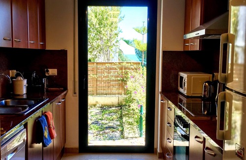 Llanca Apartment | Spacious, bright, terrace and sea view garden, near beaches and harbor, air conditioning/wf