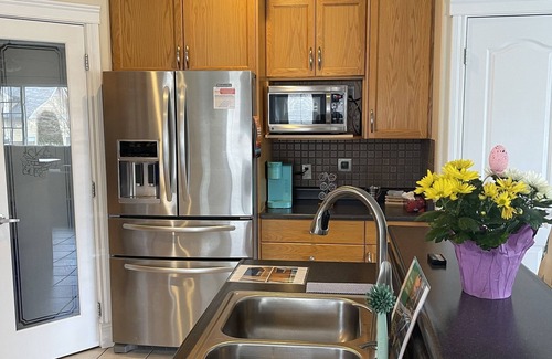 Jasper Place House | Spacious bungalow with large backyard and garage close to West Ed Mall