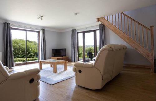 Llanybri House | Spacious bungalow with estuary views near Llansteffan