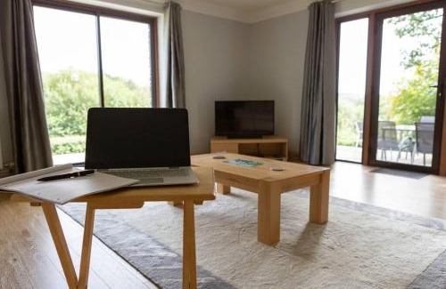 Llanybri House | Spacious bungalow with estuary views near Llansteffan