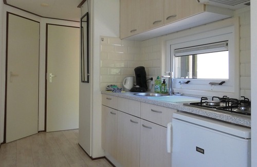 Marum Ski Chalet | Spacious chalet for rent with nice view over the grounds against forest