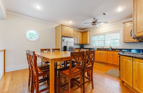 Plantation House | Spacious dog-friendly home with elevator, screened decks, on-site pool, & gym