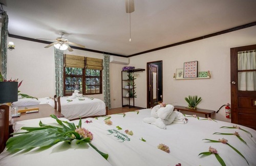 Negroman Resort | Spacious Double-Queen Casita w/Screened Porch & A/C - Steps to Treehouse Bar