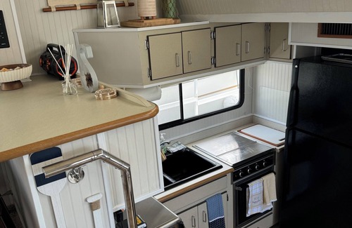 Morehead City Boat Rental | Spacious House Boat with WiFi, pool, hot-tub and fitness room in superb Beaufort
