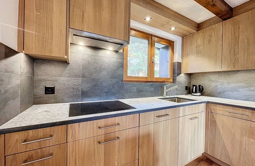 Verbier Apartment | Spacious living room with fireplace, fully equipped kitchen (Nespresso coffee machine, microwave, di