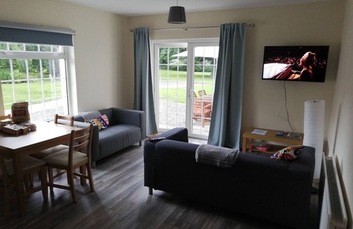Headford Cabin | Spacious S/C lodge with large garden near Lough Corrib, Galway City & Connemara