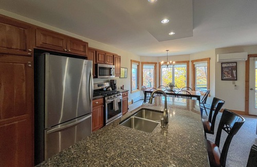 North Troy Condo | Spacious ski-in, ski-out 2-BR Jay Peak Village Condo, right on trail. A/C incl.!