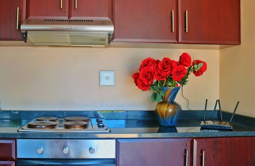 Bluff Villa | Spacious urban home with private pool in the backyard. 5 minutes from the beach.