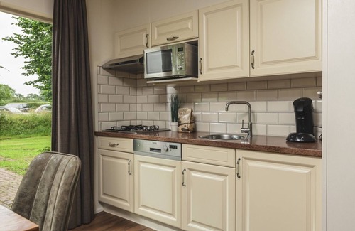 Notter Cabin | Special overnight stay in a Twente Hooiberg with private sauna and hot tub.