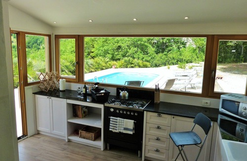 Porchia House | Spectacular views across the pool to mountains and historic village.