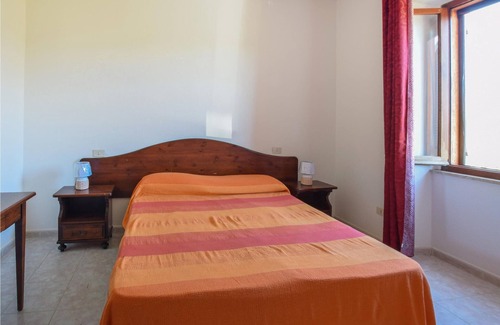 Orosei House | Spend an unforgettable vacation in this inviting cottage with beautiful views of the countryside.