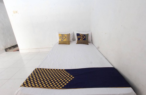 Kecamatan Janapria Hotel | SPOT ON 93441 Gians Homestay Near SMKN 2 Kuripan