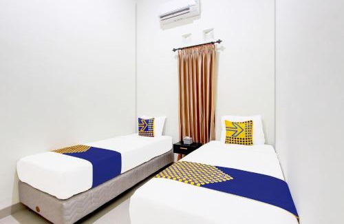 Cepu Hotel | SPOT ON 94076 Tinampi House Syariah