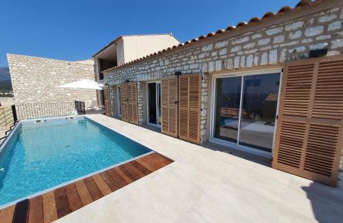 Saint-Florent Apartment | St-Florent Appartement neuf vue mer panoramique piscine 4 chambres - MOR401