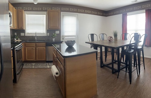 Terry Sanford House | Stay in a cozy downtown cottage within 5 mi of I-95, Hwy 301 & NC Hwy 87!