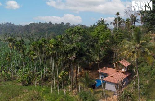 Mananthavady Villa | StayVista at Palm Tree Homes with Complimentary Breakfast, BBQ Grill and Pet-Friendly Home