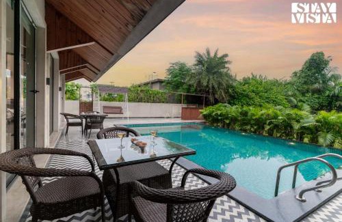 Jaipur Villa | StayVista at Rustic Roots with Bonfire, Lawn
