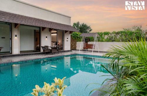 Jaipur Villa | StayVista at Rustic Roots with Bonfire, Lawn