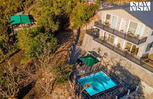 Naina Range Villa | StayVista at Sunset Springs with Pool & Views