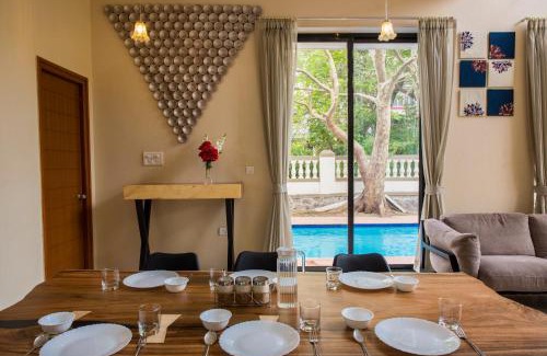 St.Stanislaus Villa Villa | StayVista's Greenwoods Villa 10 - City-Center Villa with Private Pool, Terrace, Lift & Carrom Board