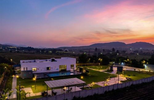 Nashik Villa | StayVista's Le Bon Horizon - Hillside Elegance with Chic Interiors, Poolside Serenity & Picturesque Gazebo - Proximity to Sula
