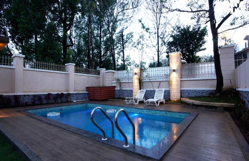Mahabaleshwar Villa | StayVista's Skylight Serenity with Modern Interiors, Outdoor Pool, Poolside Gazebo, Manicured Lawn