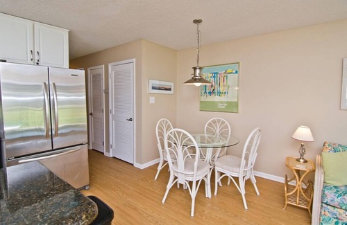 Emerald Isle Condo | Steps away from the Ocean, Gym, Gazebos, Indoor/Outdoor Pools, & Tennis Courts