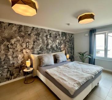 Oos Apartment | Stilvolles, modernes Apartment mit Sonnen-Balkon