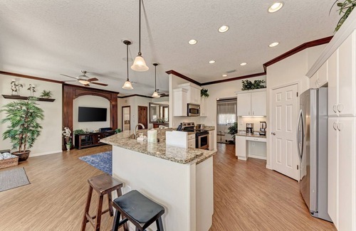 Palma Sola House | Stuck on 'Cation: Pool, Spa, Outdoor Kitchen, Screened Lanai by Anna Maria Life Vacation Rentals