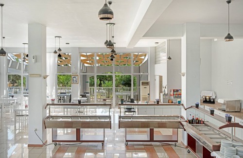 Kardamena Apartment | Studio Apartment 'Evripides Triple Room 2' with Shared Pool, Shared Garden and Air Conditioning
