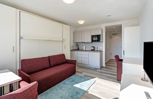 Furstenfeldbruck District Apartment | Studio Apartment "Huber Living Basic 302" with Balcony & Wi-Fi