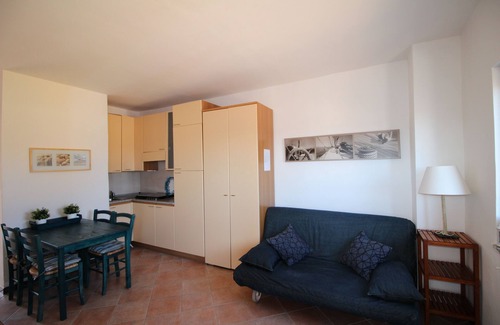 Porto Pollo Apartment | Studio apartment with sea view terrace and garden with barbecue