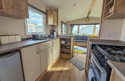 Hopton House | Stunning 6 berth caravan with decking at Broadland Sands ref 20028BS
