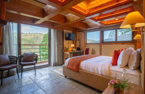 Shyamkhet Villa | Stunning Hillside 3 BHK Gateway With Indoor Pool, Attic and Classy Interiors