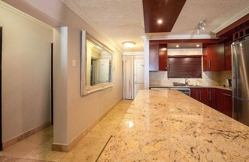 Jeffreys Bay Apartment | Stunning ocean vistas, near top surf spots, shops; private, all amenities.