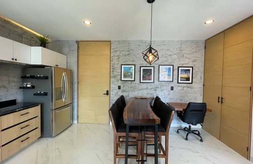 Lazaro Cardenas Condo | Stunning sunset view from the rooftop infinity pool. 5 min walk to the beach.
