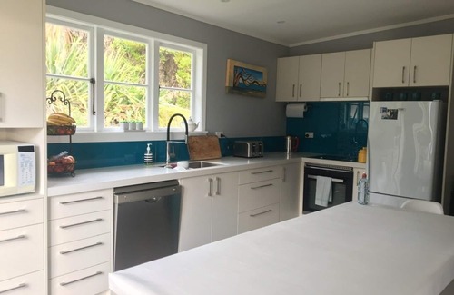 Waiomu House | Stunning view, gorgeous interior, unique outdoor comforts.