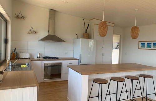 Orford House | Stunning water views; relaxed coastal atmosphere; multiple entertaining areas