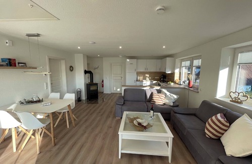 Gelting Apartment | Stuuv dree - 1st floor, sauna, wood-burning stove, balcony, garden furniture, barbecue, electric charging station