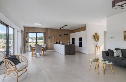 Zeewolde House | Stylish detached 6-person villa with private sauna, three en-suite bathrooms and private dock on the water