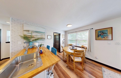 Piney House | Stylish duplex with lakefront views, modern design, and spacious interiors