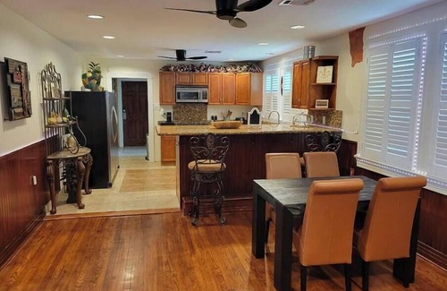 Chalmette House | Stylish Two-Bed Home with Spa Patio, Sunroom Gym