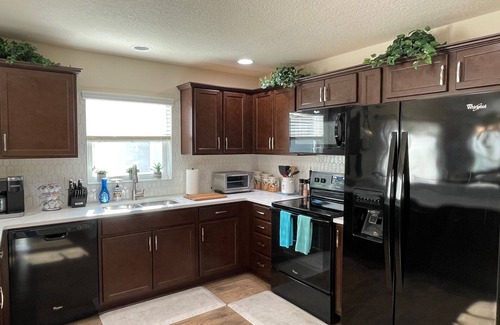 Summerfield House | Stylish villa with golf cart, BBQ, near pool & shops in tranquil setting!