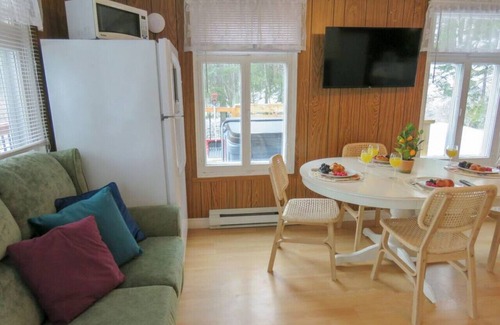 Saint-Tite-des-Caps Ski Chalet | Stylish-vintage refuge near Massif & MSA with spa