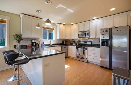 Greenwood House | Stylist Home with Dual Suites near Green Lake