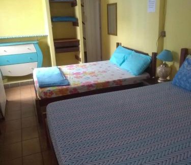 Centro House | Suíte Aconchegante