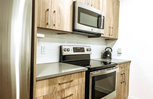 Golden Condo | Suite Retreat - 1 Bed+Den Condo