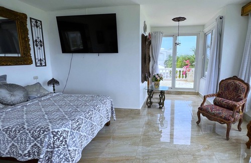 Cabrera Hotel | Suite with two pools, ocean view balcony, & walk-in shower- beach minutes away!