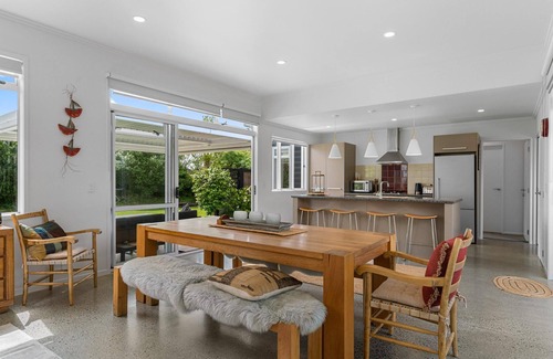 Mangawhai House | Sun Central - Modern, sunny holiday home in tranquil garden setting