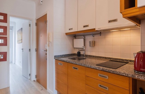 Sao Bento Apartment | Sunny Design Apt in Praça das Flores by LovelyStay